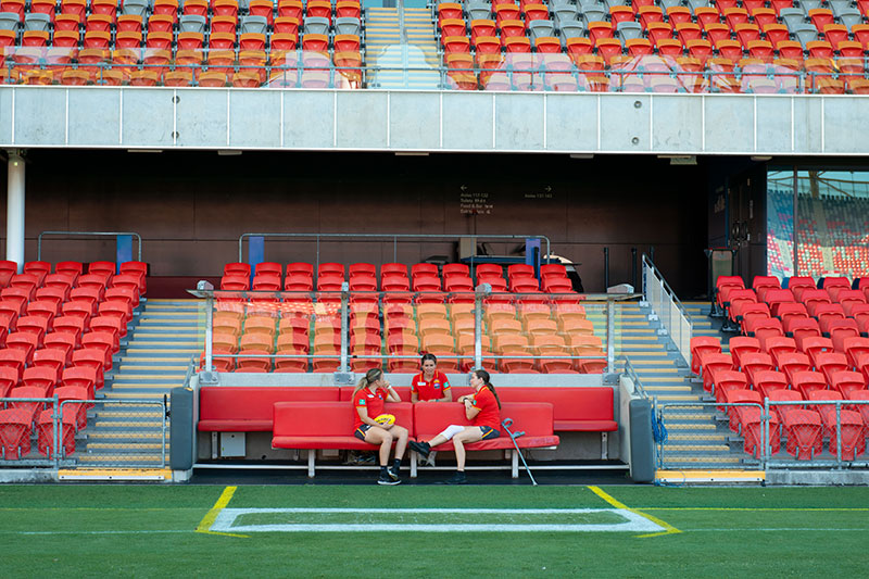 Gold Coast SUNS players in stadium